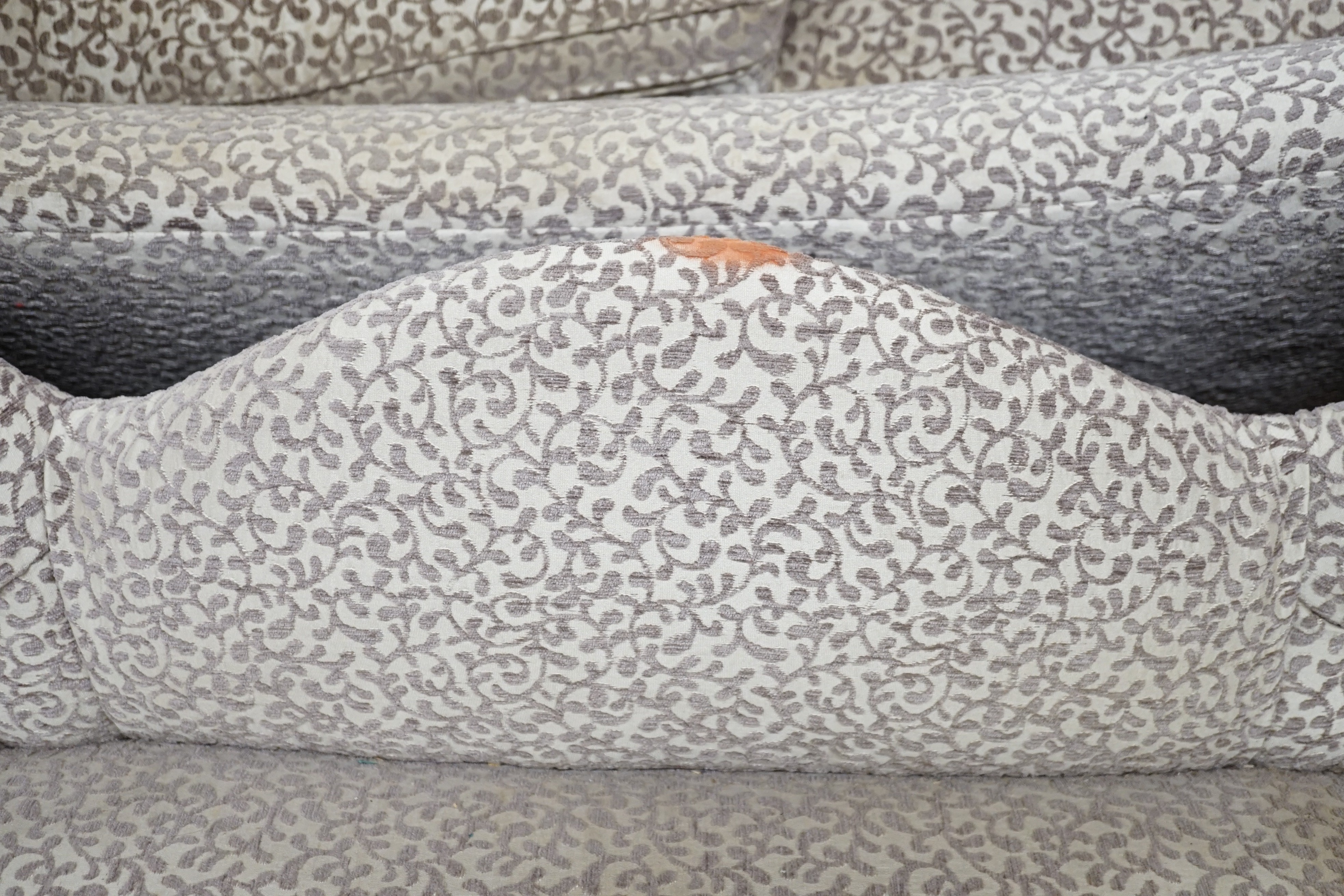 A Victorian and later walnut button back upholstered salon settee, with cabriole legs fitted ceramic castors, length 174cm